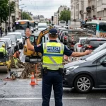 Traffic Chaos in Poissy: Why Human Agents Beat Traffic Lights